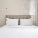 Cozy And Well Designed 2Br At Green Pramuka City Apartment By Travelio