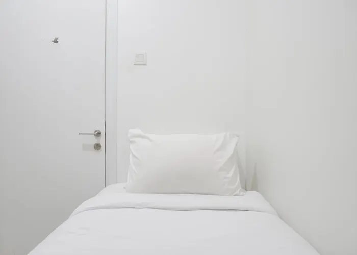 Cozy And Well Designed 2Br At Green Pramuka City Apartment By Travelio